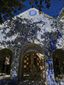 a building with blue tiles on the wall